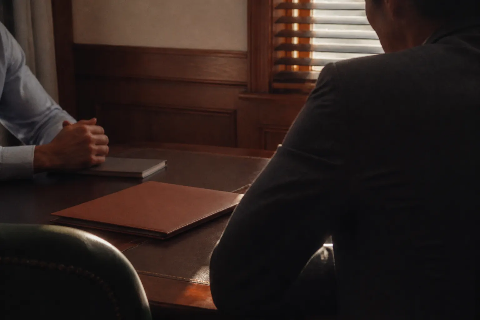 A confidential advisory meeting. Not a photograph of Jason Taken.