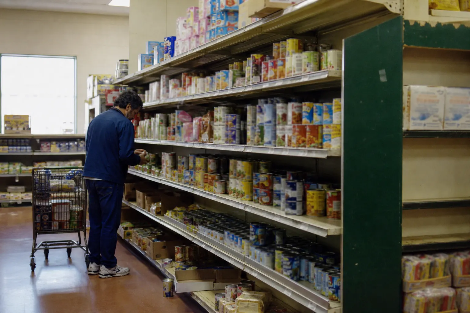 Interior of a discount salvage grocery, used to illustrate selling that format.